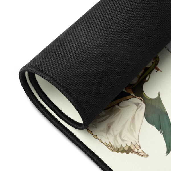 Close-up of Mila desk mat rolled edge – anti-slip rubber base with stitched edges and printed dragon wing design from Fire Emblem Echoes
