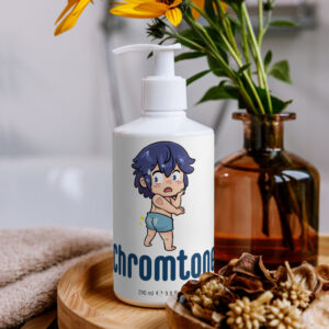 Chromtone Fire Emblem Lotion displayed on spa counter with towel and flowers.