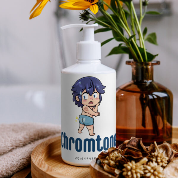 Chromtone Fire Emblem Lotion displayed on spa counter with towel and flowers.