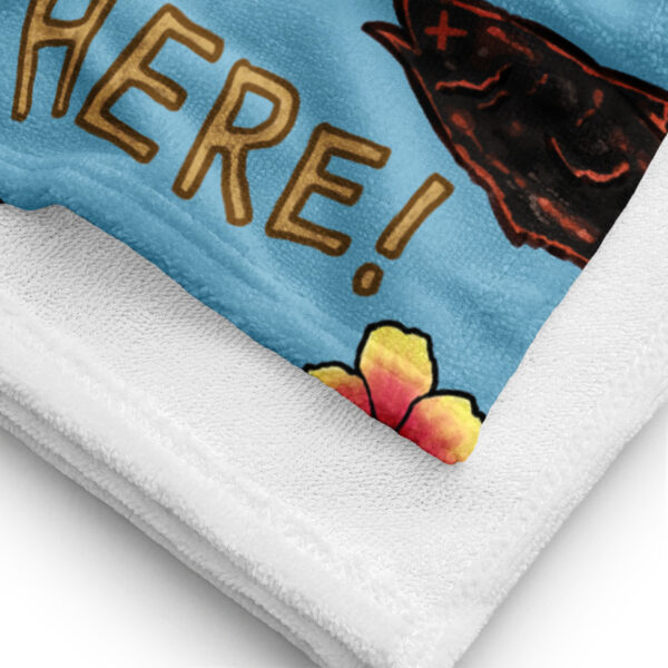 Close-up of the Fire Emblem Towel fabric, capturing the bold “HERE!” lettering and colorful beach details from the Summer Scramble (Ocean) design.