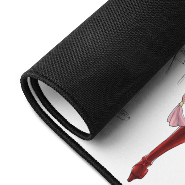 Rolled corner view of Tiki Desk Mat - Concept Art showing edge stitching and the red boot design element.