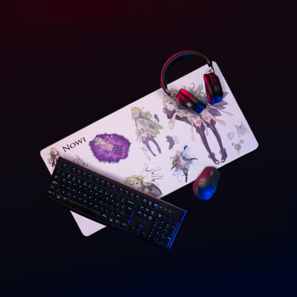Nowi desk mat on a gaming desk with headset and keyboard, featuring vibrant Fire Emblem concept art.