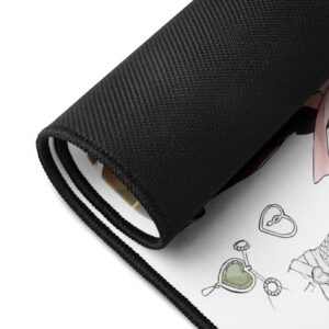 Close-up of a rolled Nowi desk mat showing detailed artwork and durable black edge stitching.