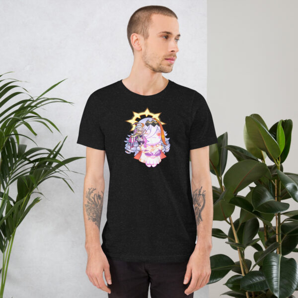 Black tee, male model – Male model wearing the Vali’s Baldr Plushie – Fire Emblem Shirt in black, standing by plants.