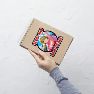 Large Fire Emblem Sticker of Tiki’s critical hit pose and quote placed on a spiral notebook for scale.