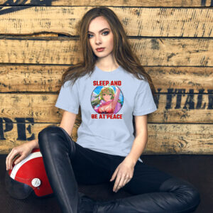 Seated female model wearing Fire Emblem Tiki Shirt in light blue with leather pants