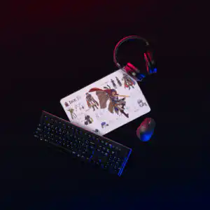Fire Emblem Desk Mat with Ike on gaming setup, keyboard and headset included.