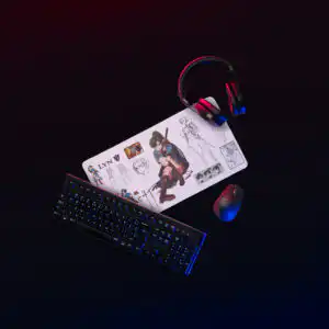 Fire Emblem Desk Mat setup with keyboard and mouse glowing Lyn design