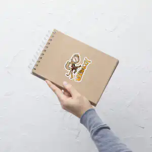Lateology - Sticker FEHology Sticker of Joel chibi character on a notebook, playful Lateology artwork