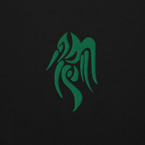 Fire Emblem Hoodie close-up of the green Heron Brand embroidered crest on black fabric.