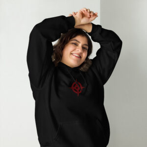 Hoshido - Unisex Embroidered Hoodie Fire Emblem Hoodie featuring the emblem of hoshido on a black hoodie, modeled by a woman smiling with arms raised.