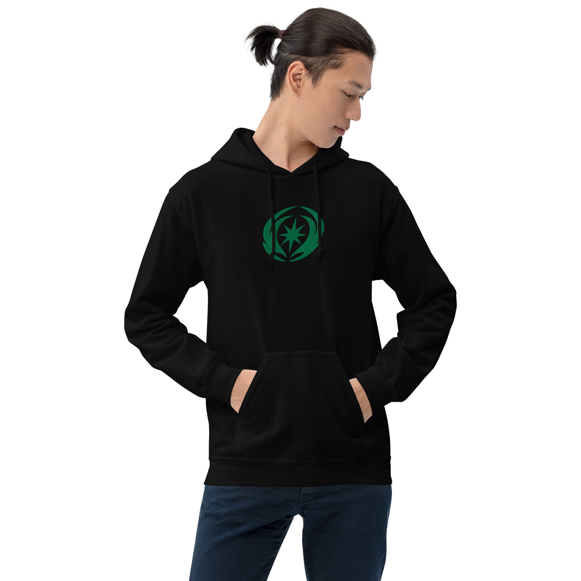 Revelation - Unisex Embroidered Hoodie Fire Emblem Hoodie with green Valla emblem worn by man in black unisex hoodie.