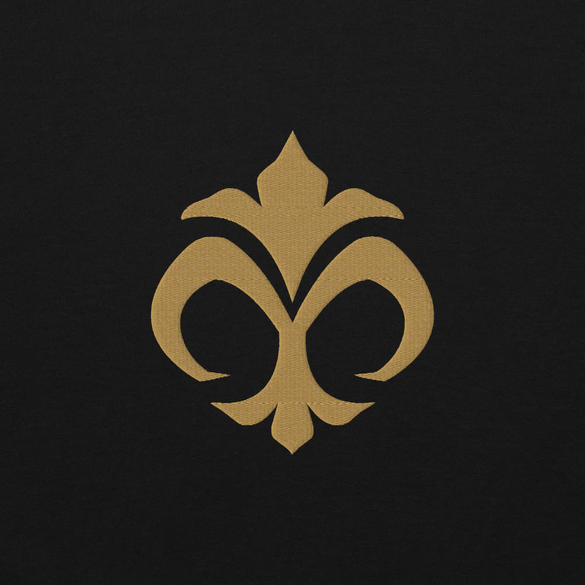 Emblem of Mila - Embroidered Unisex Hoodie Fire Emblem Hoodie featuring the golden Emblem of Mila embroidered on black fabric.