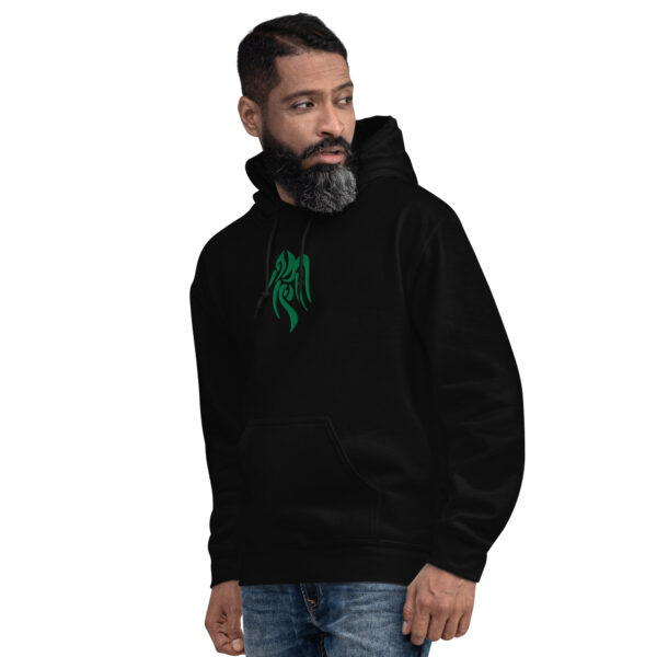 Fire Emblem Hoodie featuring the green Heron Brand crest embroidered on a black unisex hoodie, modeled by a man.