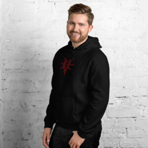 Fire Emblem Hoodie in black with red Grimleal design, modeled by smiling man standing against brick wall.