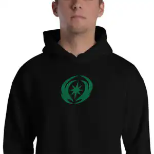 Fire Emblem Hoodie with Revelation crest embroidery worn by man in black unisex hoodie.