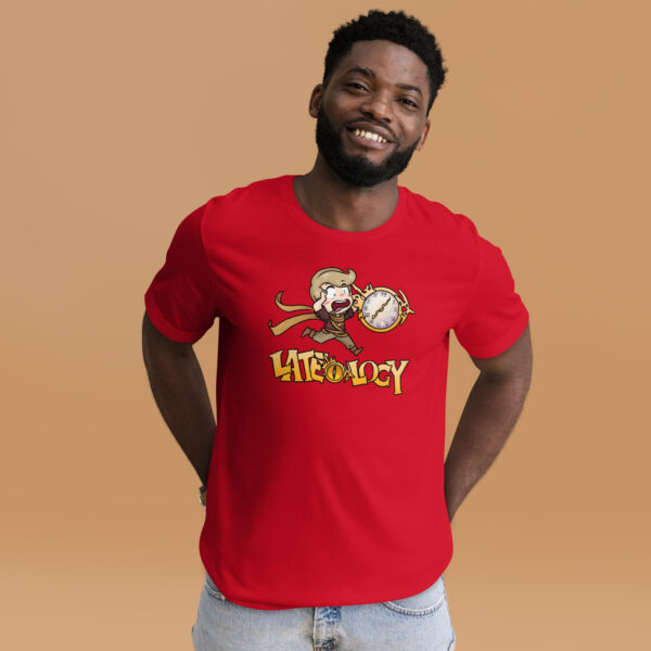 FEHology shirt in red featuring the Lateology meme design, modeled with hands in pockets.