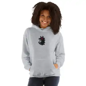 A smiling model wearing the white Fire Emblem Hoodie with the Shadows wolf emblem from Fire Emblem Shadows.