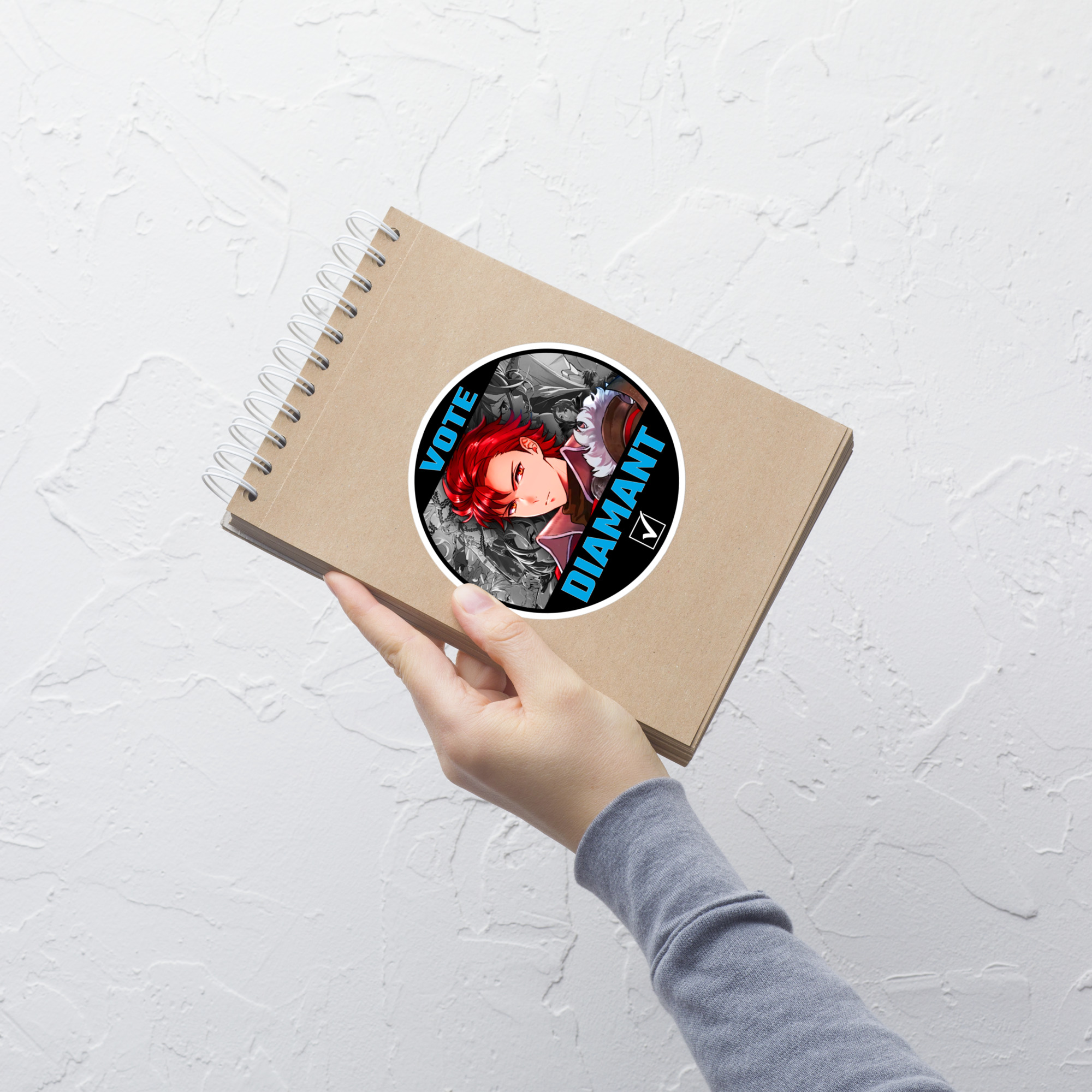 Vote for Diamant - Sticker 5x5 CYL10 Diamant Fire Emblem sticker displayed on a notebook in hand