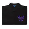 Detailed embroidery on black Fire Emblem polo showing Crest of Flames design