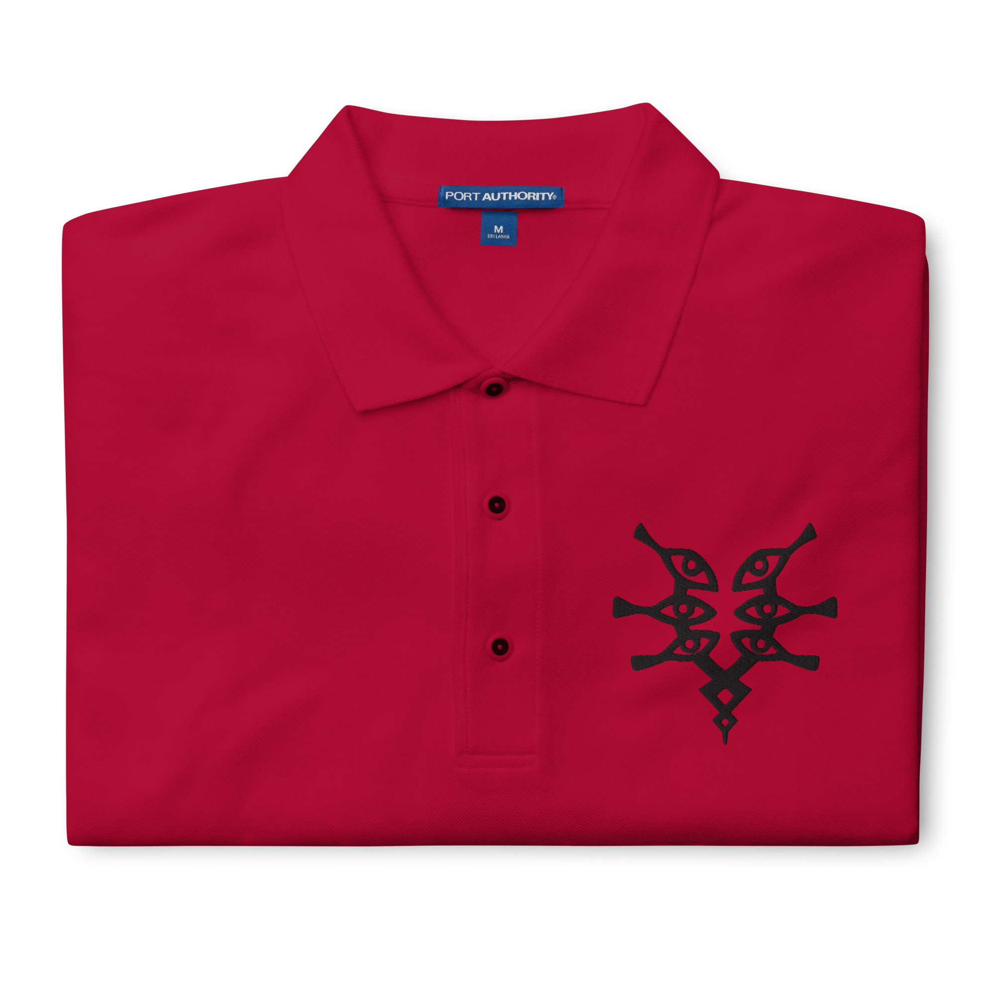 Grimleal - Embroidered Polo Folded red Fire Emblem polo with black Grimleal symbol embroidered on the chest